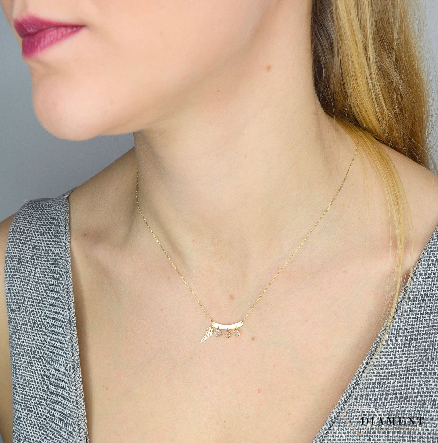 Złoty naszyjnik celebrytka 585 'wiszące cyrkonie z piórem'  NA 1902.jpg